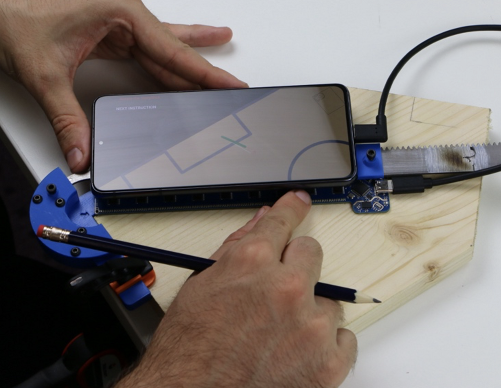 StoryStick++ is a phone clip on for measuring and marking without mental arithmetic. Market research highlighted tacit build knowledge, unclear manufacturing effort, and missing cost and viability answers.
